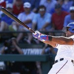 Texas Rangers Adrian Beltre makes contact for an RBI-single during the fifth inning of a baseball game against the Seattle Mariners, Monday, April 4, 2016, in Arlington, Texas. (AP Photo/Brandon Wade)
