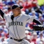 Seattle Mariners starting pitcher Felix Hernandez (34) throws during the first inning of a baseball game against the Texas Rangers, Monday, April 4, 2016, in Arlington, Texas. (AP Photo/Brandon Wade)