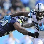 Carolina Panthers wide receiver Jerricho Cotchery (82) moves by Seattle Seahawks middle linebacker Bobby Wagner (54) during the first half of an NFL divisional playoff football game, Sunday, Jan. 17, 2016, in Charlotte, N.C. (AP Photo/Mike McCarn)