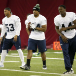 Seattle Seahawks' Bobby Wagner (54), Malcolm Smith (53) and Ryan Robinson (44) run drills during a team practice for NFL Super Bowl XLIX football game, Friday, Jan. 30, 2015, in Tempe, Ariz. The Seahawks play the New England Patriots in Super Bowl XLIX on Sunday, Feb. 1, 2015. (AP Photo/Matt York)