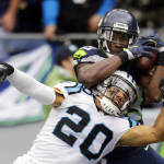 Seattle Seahawks wide receiver Ricardo Lockette (83) makes a touchdown catch above Carolina Panthers free safety Kurt Coleman (20) in the second half of an NFL football game, Sunday, Oct. 18, 2015, in Seattle. (AP Photo/Stephen Brashear)