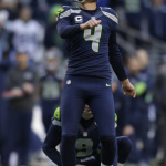 Seattle Seahawks kicker Steven Hauschka, left, watches field goal against the St. Louis Rams in the second half of an NFL football game, Sunday, Dec. 28, 2014, in Seattle.  (AP Photo/John Froschauer)