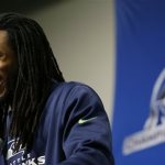 Seattle Seahawks cornerback Richard Sherman talks to reporters on Wednesday, Jan. 15, 2014, before NFL football practice in Renton, Wash. The Seahawks are to play the San Francisco 49ers on Sunday in the NFC championship. (AP Photo/Ted S. Warren)