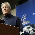 Seattle Seahawks head coach Pete Carroll listens to a question as he talks to reporters, Wednesday, Jan. 15, 2014, in Renton, Wash. The Seahawks will play the San Francisco 49ers Sunday in the NFL football NFC championship in Seattle. (AP Photo/Ted S. Warren)