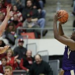 
              Washington's Noah Dickerson, right, shoots against Washington State's Conor Clifford during the first half of an NCAA college basketball game, Saturday, Jan. 9, 2016, in Pullman, Wash. (AP Photo/Young Kwak)
            