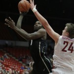 
              Colorado's Wesley Gordon (1) shoots against Washington State's Josh Hawkinson (24) during the first half of an NCAA college basketball game Saturday, Jan. 23, 2016, in Pullman, Wash. (AP Photo/Young Kwak)
            