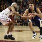 
              Washington guard Andrew Andrews, right, drives the ball by Southern California guard Julian Jacobs, left, during the first half of an NCAA college basketball game in Los Angeles, Saturday, Jan. 30, 2016. (AP Photo/Kelvin Kuo)
            